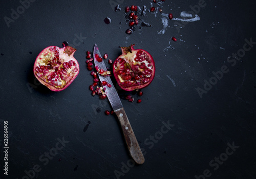 Pomegranate fruit on a dark background