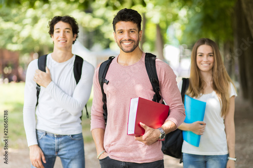 Happy students outdoor smiling photo