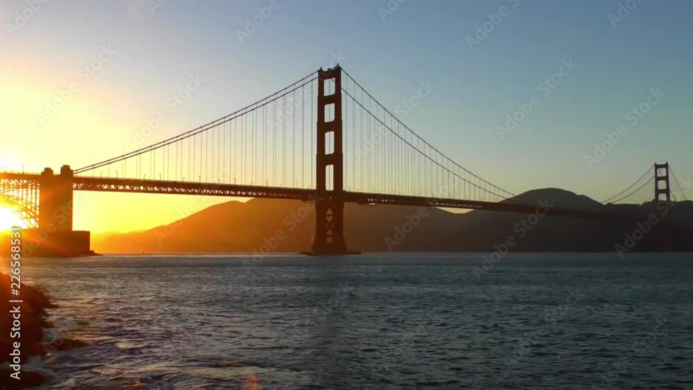 The Golden Gate Bridge at sunset as seen from Chrissy Field, San Francisco, California, USA The Golden Gate Bridge at sunset as seen from Chrissy Field, San Francisco, California, USA