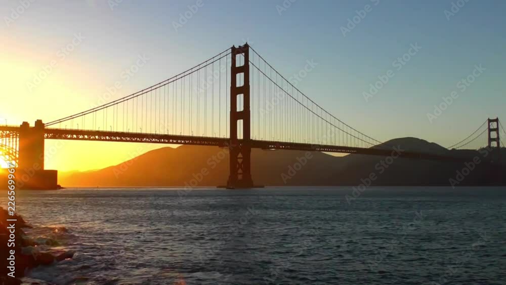 The Golden Gate Bridge at sunset as seen from Chrissy Field, San Francisco, California, USA The Golden Gate Bridge at sunset as seen from Chrissy Field, San Francisco, California, USA
