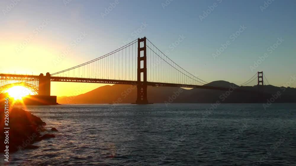 The Golden Gate Bridge at sunset as seen from Chrissy Field, San Francisco, California, USA The Golden Gate Bridge at sunset as seen from Chrissy Field, San Francisco, California, USA