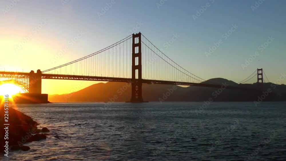 The Golden Gate Bridge at sunset as seen from Chrissy Field, San Francisco, California, USA The Golden Gate Bridge at sunset as seen from Chrissy Field, San Francisco, California, USA