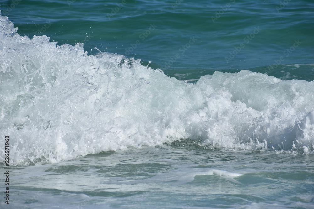 Ocean waves breaking