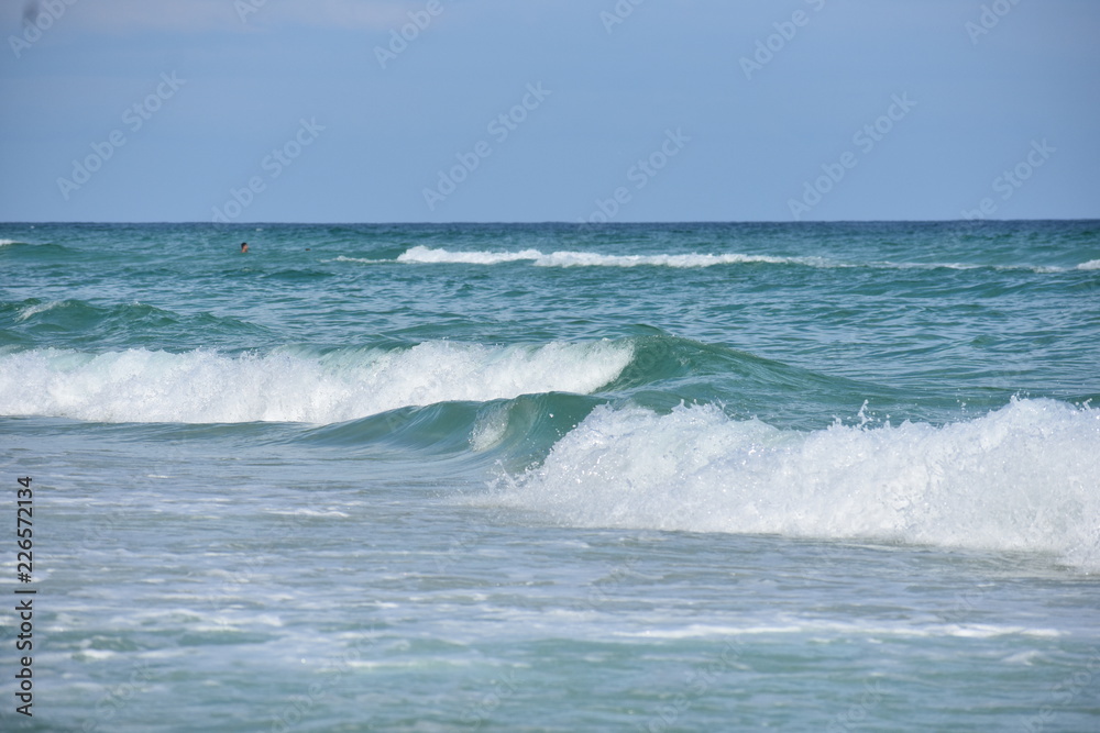 waves breaking on the beach