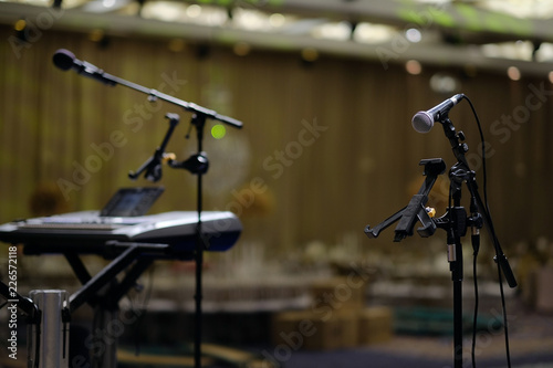 Microphone on a rack close-up.In the banquet room the microphone on a rack on the stage before the celebration