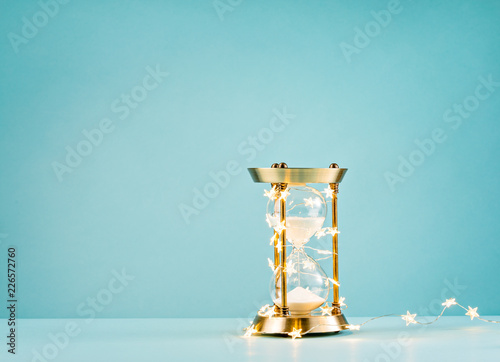 Fotografie Hourglass with christmas star lights
