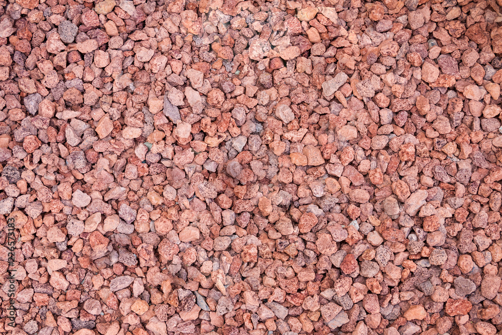 Red pebble grungy background, Close up crushed Red rock. Red pebble grungy background, Close up crushed Red rock.