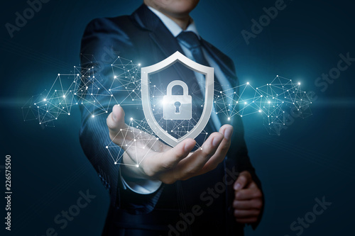 Protection network security computer in the hands of a businessman .