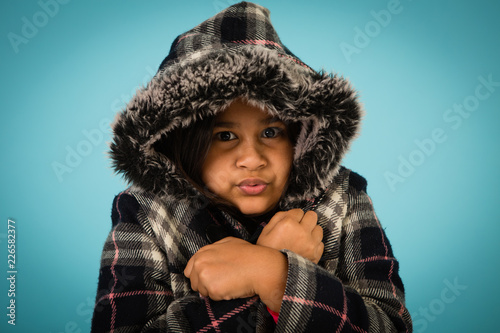 Slika na platnu Winter Girl Shivering in the Cold, Isolated in Studio