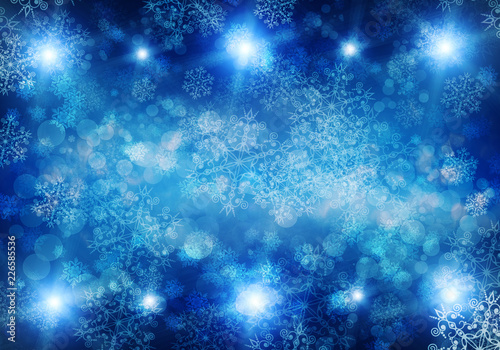 Christmas background with fir branches, lights, snowflakes, bokeh.