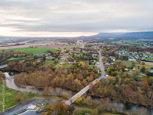 Aerial of the small town of Elkton, Virginia in the Shenandoah Valley with Mountains in the Distance