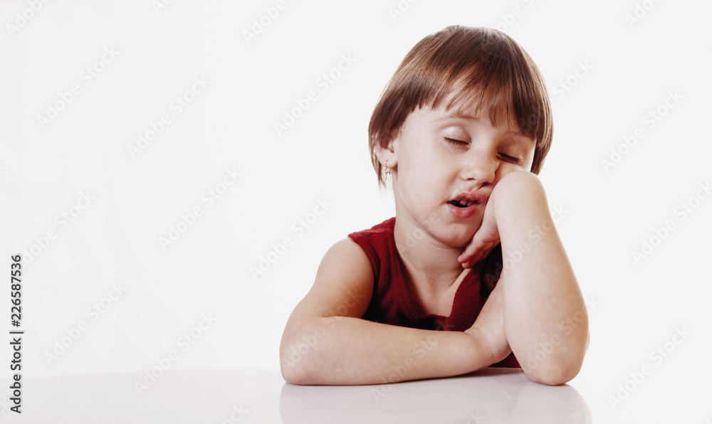 Portrait of cute little child girl showing very lazy unhappy bored and tired gesture Portrait of cute little child girl showing very lazy unhappy bored and tired gesture