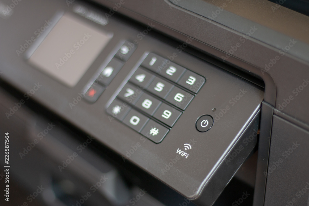 DE LIER, NETHERLANDS - AUGUST 28 2018: Close up of a printer control panel DE LIER, NETHERLANDS - AUGUST 28 2018: Close up of a printer control panel