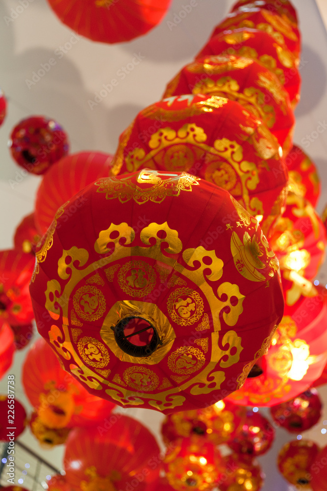 Red Chinese lanterns hanging from ceiling