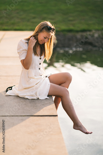 Happu smiling woman at the lake photo