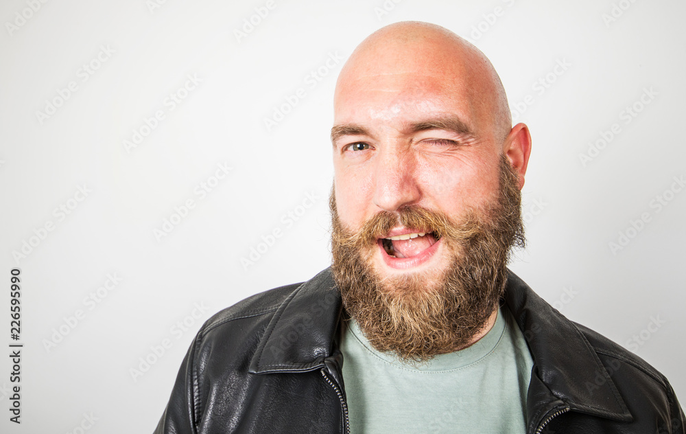a smiling bearded man a smiling bearded man