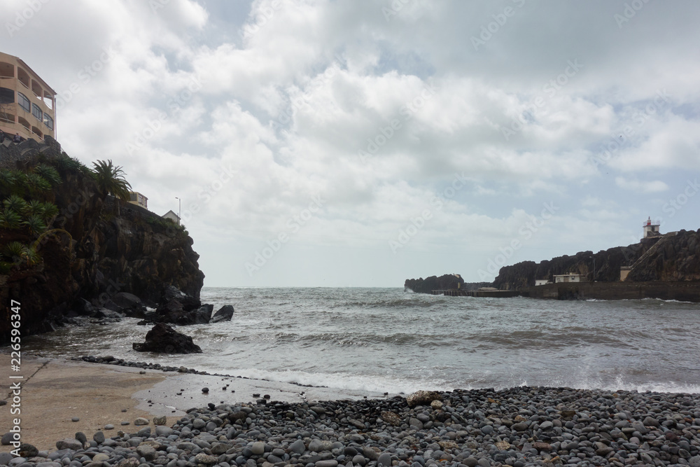 Black stone beach in Câmara de Lobos, Madeira