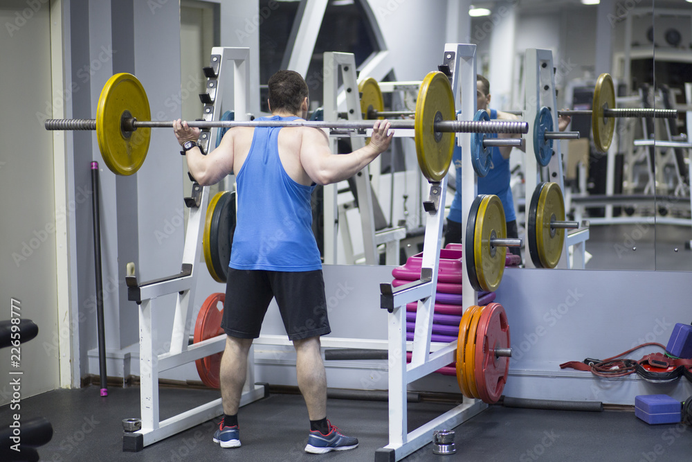 man working out in gym man working out in gym