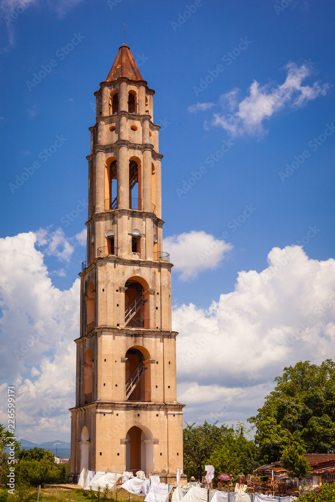 The tower of Manaca Iznaga in Valley de los Ingenios, Cuba. The tower was built to control slaves working in sugar cane fields and mills