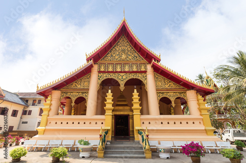 Wat Ong Teu Mahawihan (Temple of the Heavy Buddha), a Buddhist monastery, in Vientiane, Laos, on a sunny day.