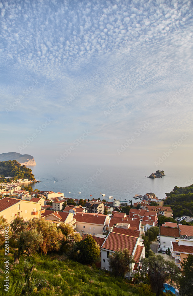 Orange roofs of houses in Montenegro. The Town Of Petrovac. Sunset. 