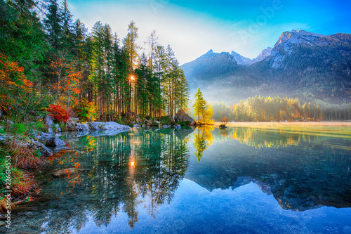 Fototapeta Naklejka Na Ścianę i Meble -  Fantastic autumn sunny day on Hintersee lake. Beautiful scene of mirror reflection in water