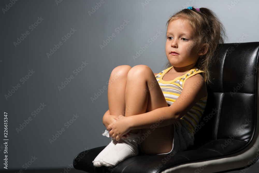 Fototapeta premium Girl four years on a chair
