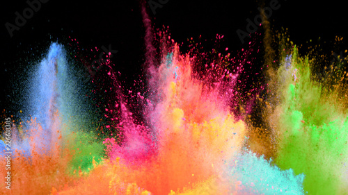 Multi-color powder explosion on black background