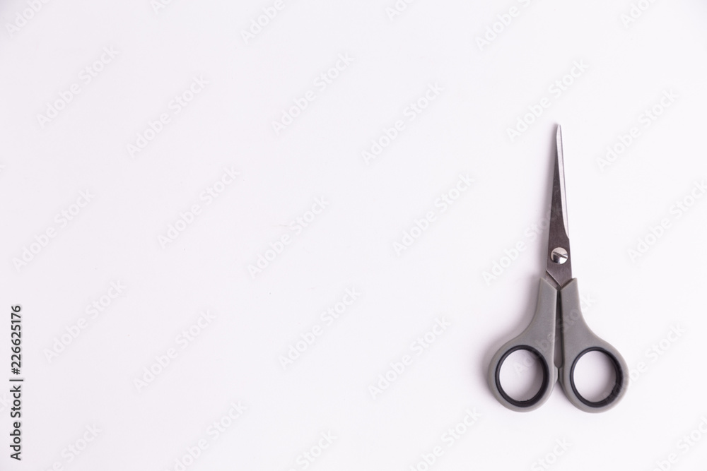 scissors on top of white background scissors on top of white background