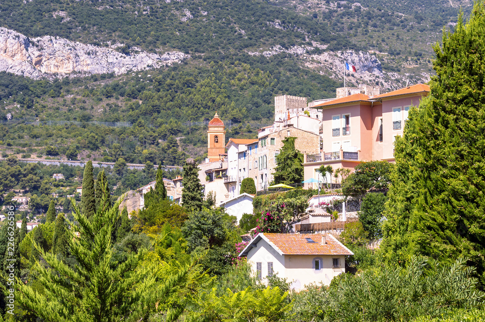 Panoramic view the medieval village of Roquebrune with its red Church bell tower