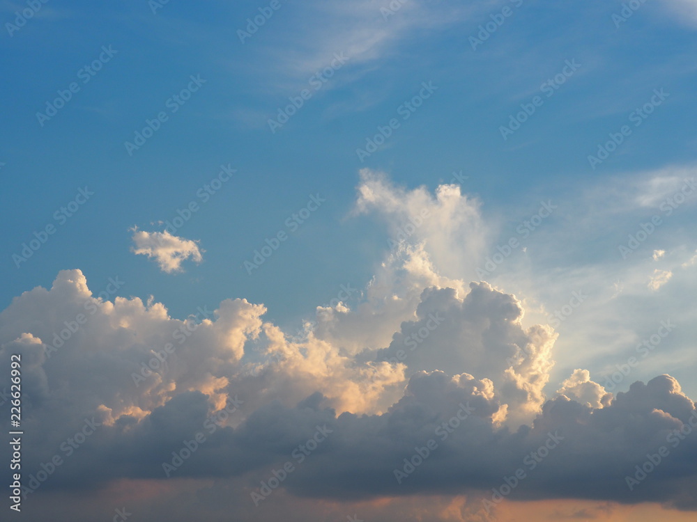 Sky and clouds with evening light. The moment of happiness and freedom is heaven.