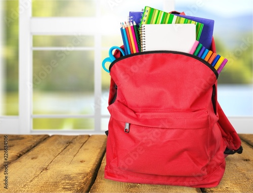 Red School Backpack on background.