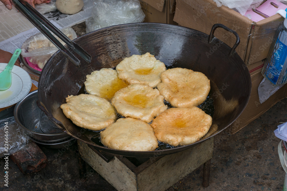 Traditional Vietnamese pastry pancakes deep fried in oil