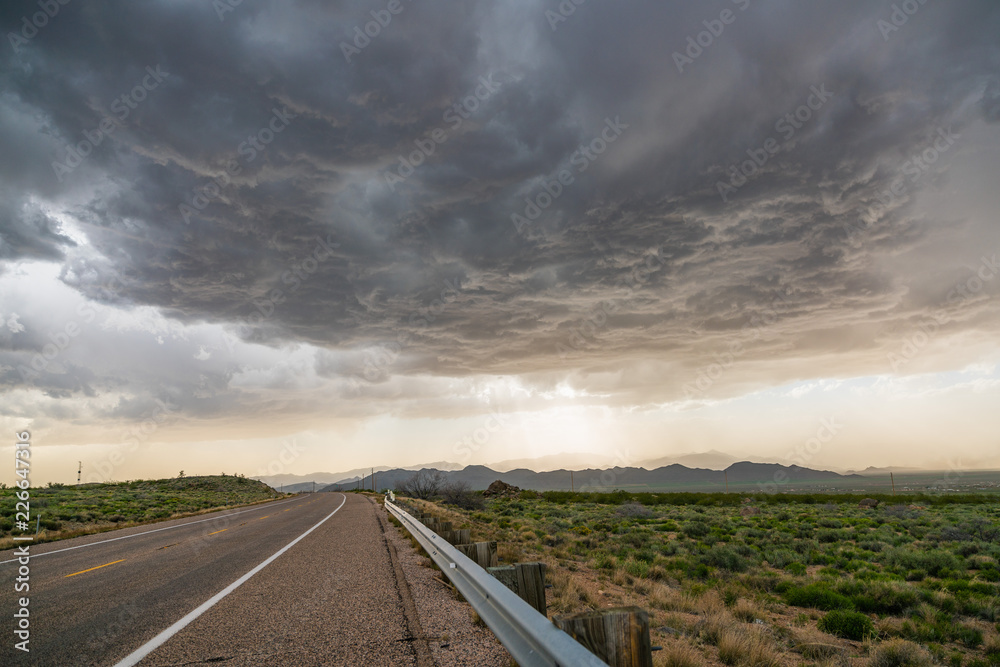 Roadway and stormy clouds