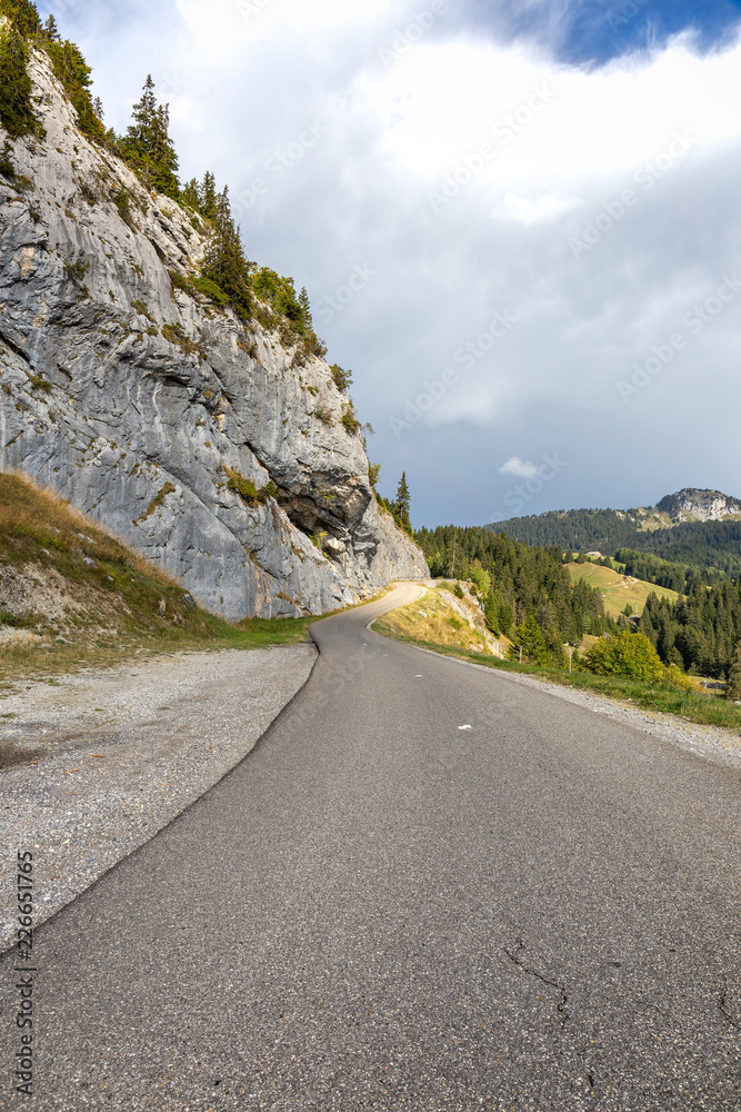 Mountain road in France near Annecy on an overcast day before the rain