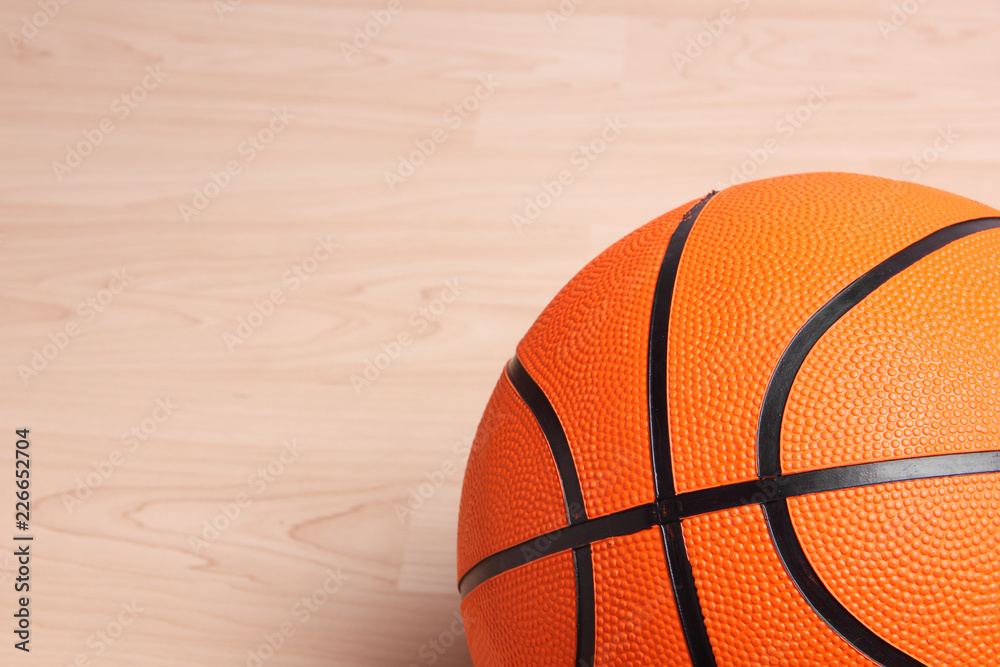 Basketball on hardwood floor Basketball on hardwood floor