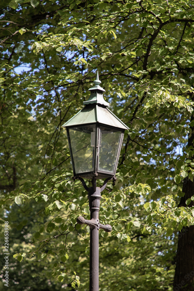 Street lamp on the sidewalk by Turku Cathedral in Turku, Finland.