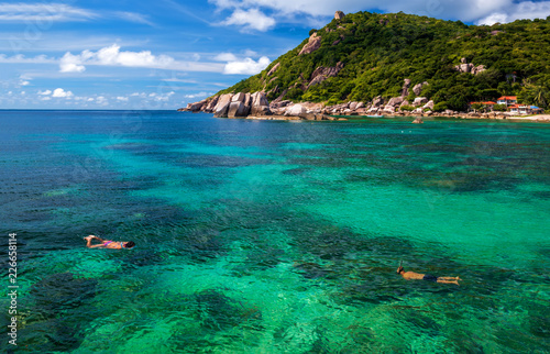 Snorkling on tropical island in the sea