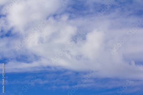 Blue sky with clouds background