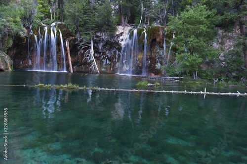 Fototapeta Naklejka Na Ścianę i Meble -  Colorado mountain waterfall with lots of fresh green scenery
