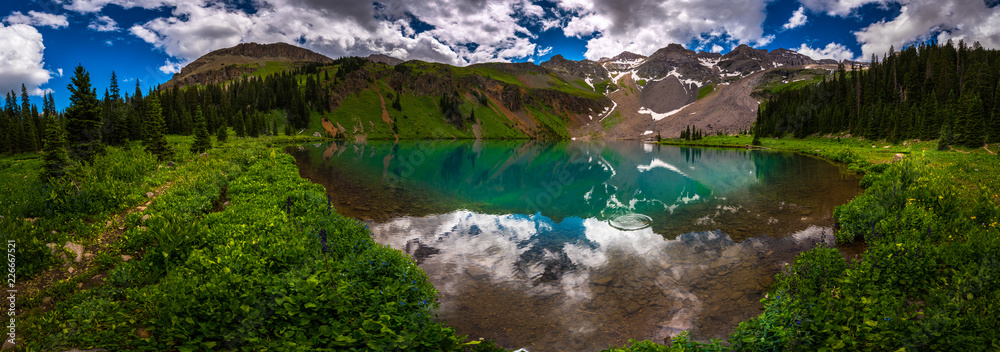 Fototapeta premium Blue Lake near near Ridgway Colorado with Mountain Sneffels, Dallas Peak and Gilpin Peak in the background