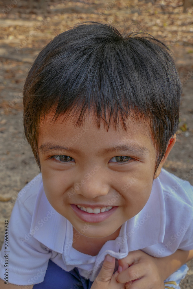 Portrait of Asian little boy smiling outdoor Portrait of Asian little boy smiling outdoor