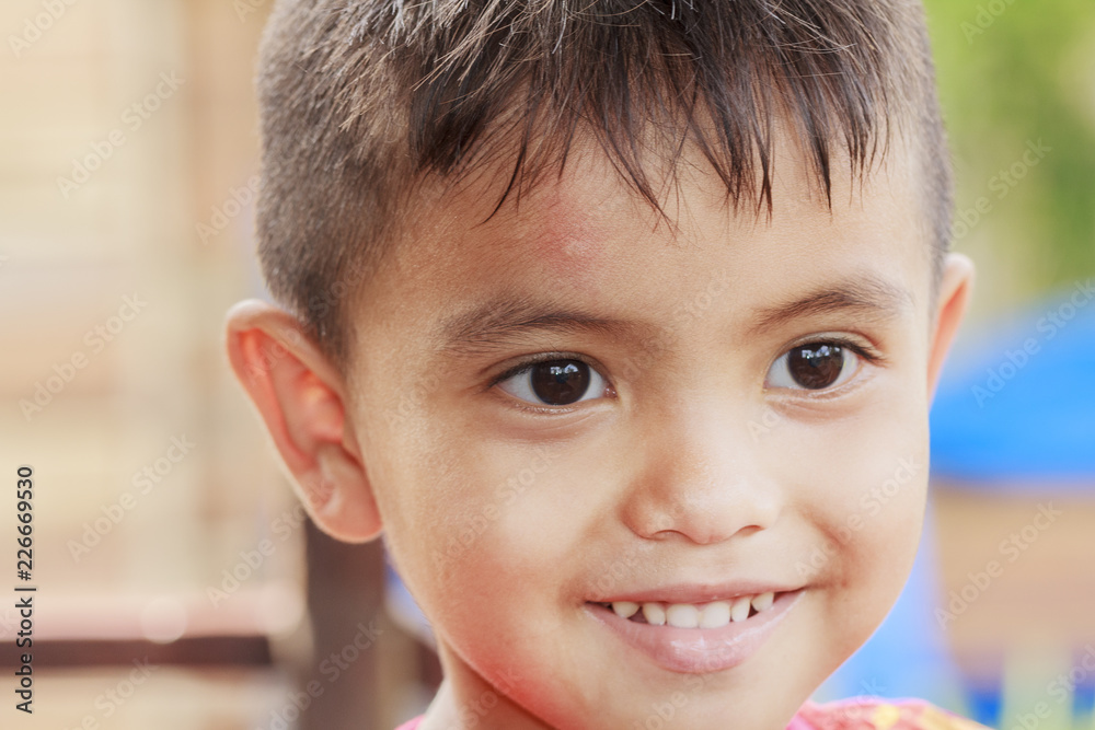 Asian little boy smiling outdoor Asian little boy smiling outdoor
