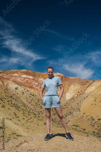 Woman in valley of Mars landscapes in the Altai Mountains  Kyzyl Chin  Siberia  Russia