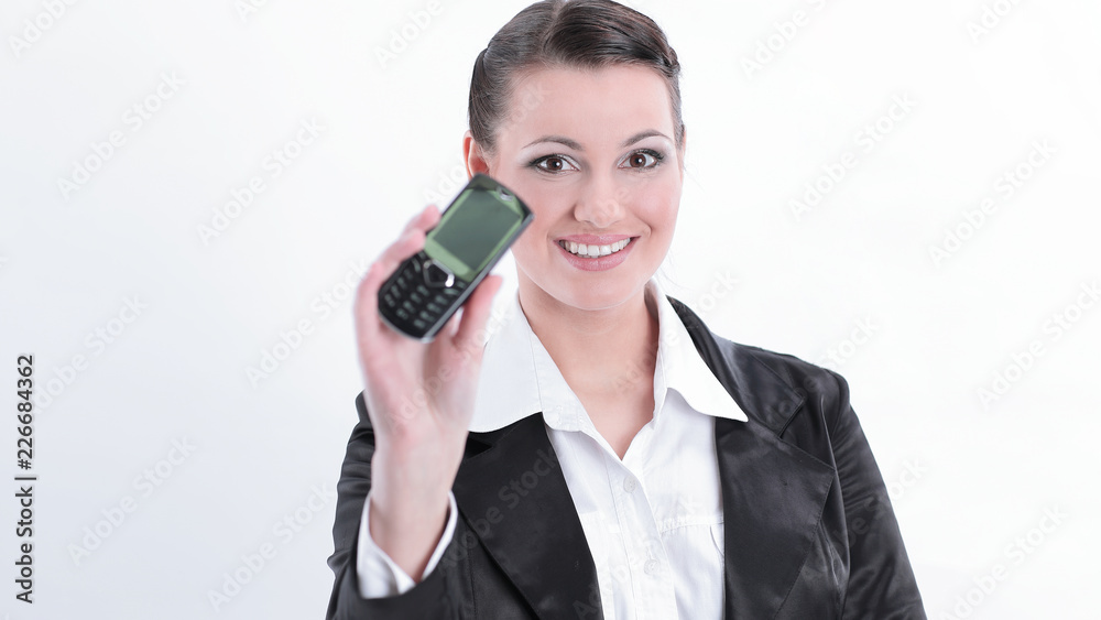 closeup.smiling business woman showing mobile phone. closeup.smiling business woman showing mobile phone.