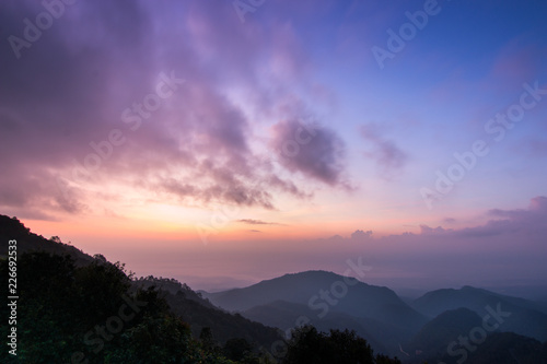 Beautiful sunrise on mountain at Doi Ang Khang mountain , Chiangmai Thailand