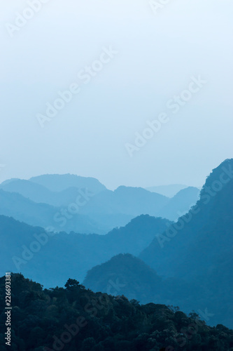 Beautiful sunrise blue sky on blue mountain at Doi Ang Khang  , Chiangmai  Thailand