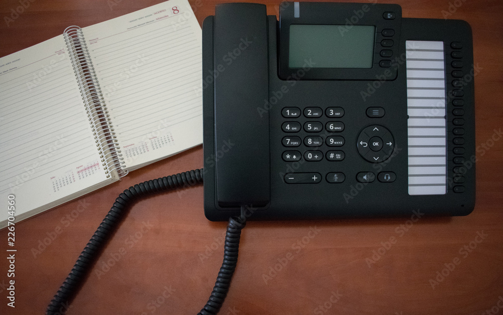 business desktop working with phone business desktop working with phone