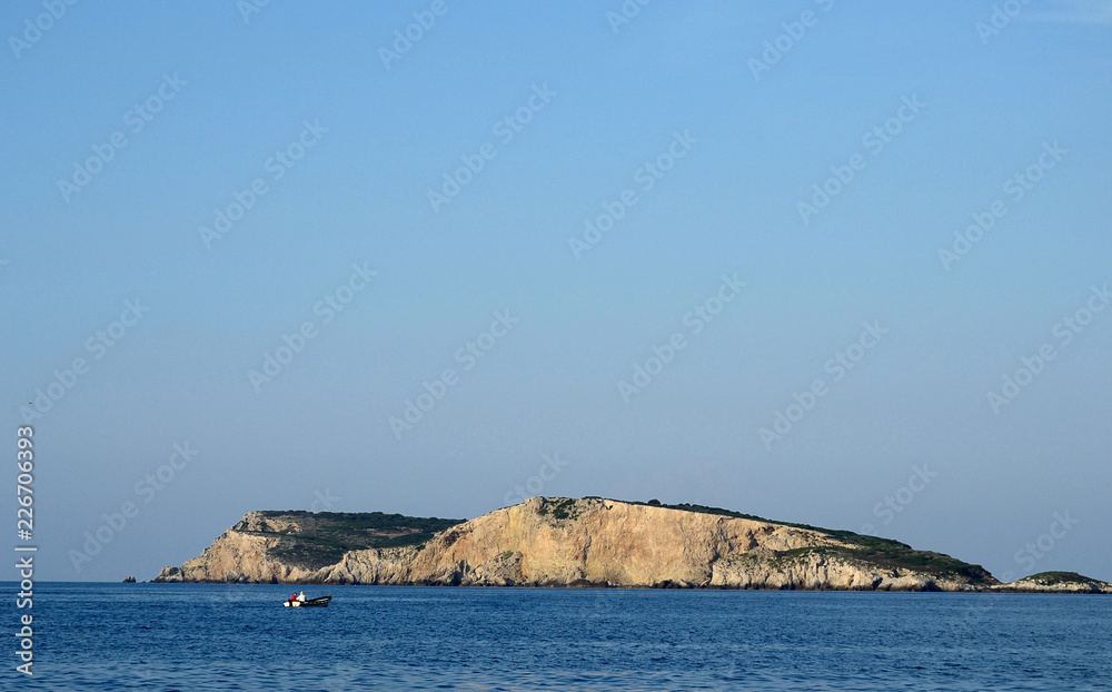 Puglia, Italy, August 2018, seascape of the southern adriatic with Capraia island of Tremiti archipelago, at sunset