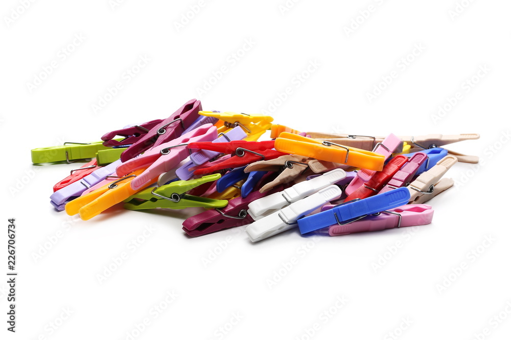 Colorful plastic clothespins isolated on white background Colorful plastic clothespins isolated on white background